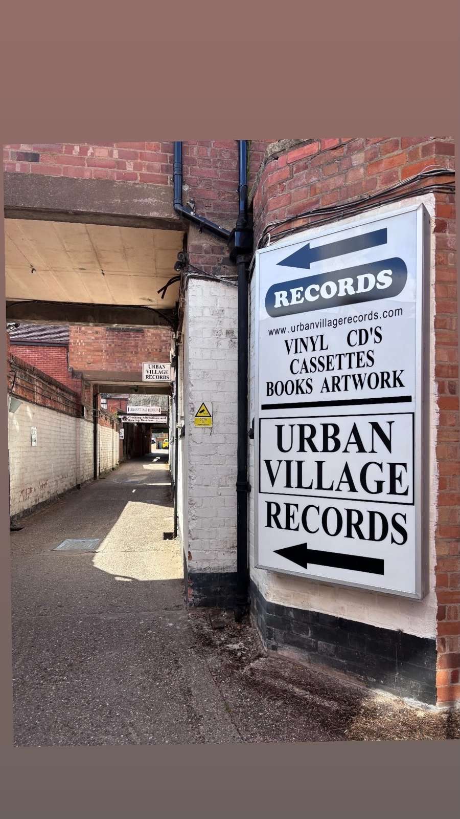 Urban Village Records sign at the entrance to the record shop in Henley in Arden